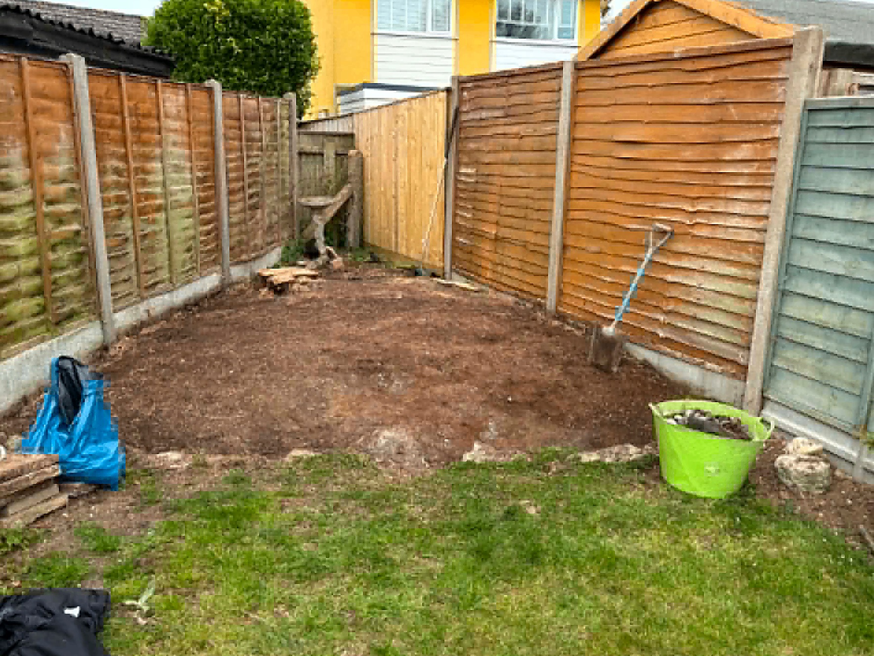Garden cleared down to bare soil ready for landscaping