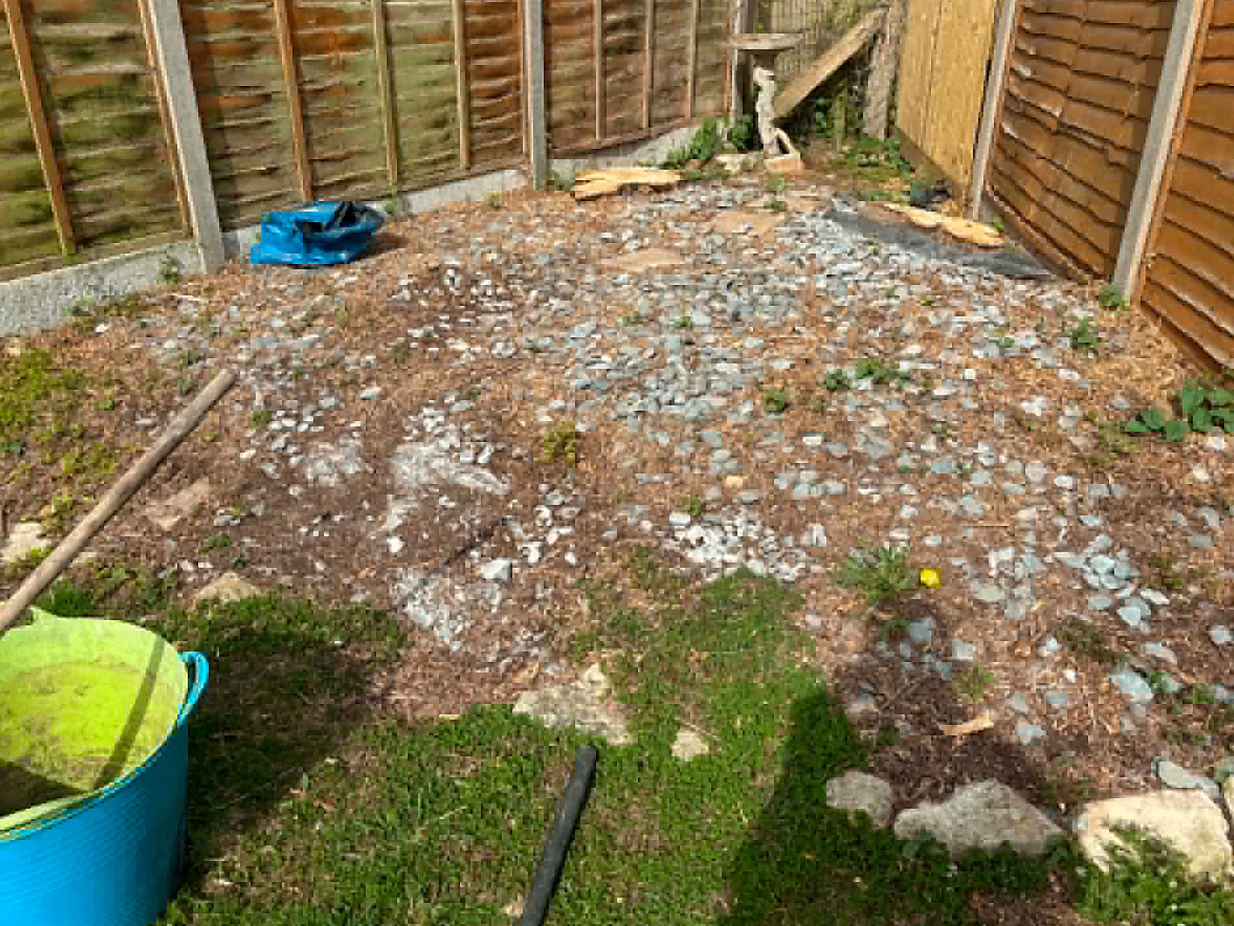 Gravel and rubble cleared from a back garden